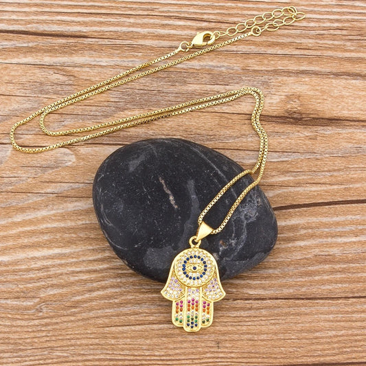 HAMSA CON AYIN Y PIEDRERIA